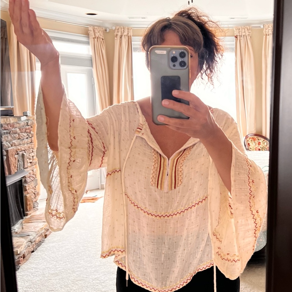 Free People barely worn top. It’s XS but can be worn up to size medium.